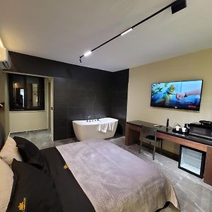 Kamer met een Queen Size Bed